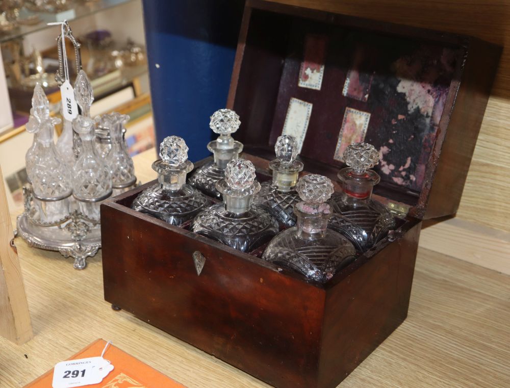 A Victorian plated cruet and a 19th century mahogany and mother of pearl inlaid decanter box, six fitted decanters, one associated stop